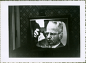 Thumbnail for Man on TV …