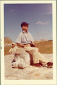 Thumbnail for Man sitting on …