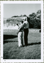 Thumbnail for Two men looking …
