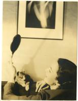 Thumbnail for Woman with handheld …